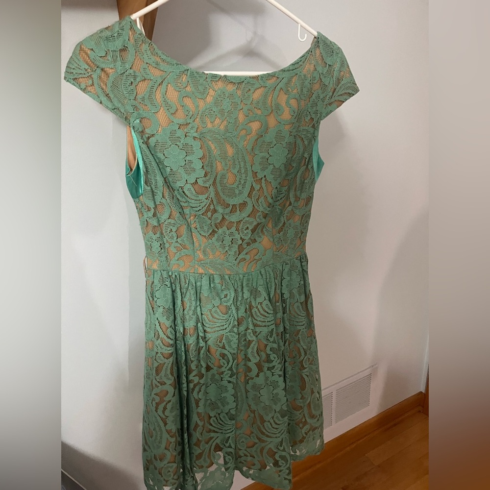 Elegant Teal Lace Dress with Nude Undertone